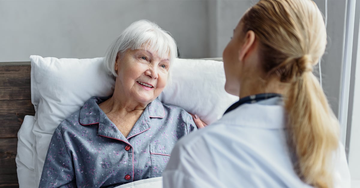 Image showing an elderly woman and a nurse at a healthcare facility